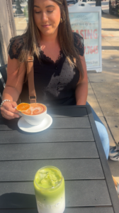enjoying a coffee at cure suffolk outside